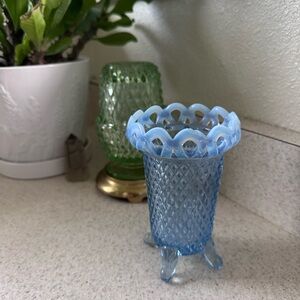 Elegant lace edge opalescent footed bud vase.